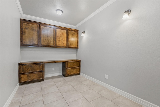 2800 Virginia Ave, League City, TX 77573 - unfurnished office with built in study area, crown molding, baseboards, and light tile patterned flooring