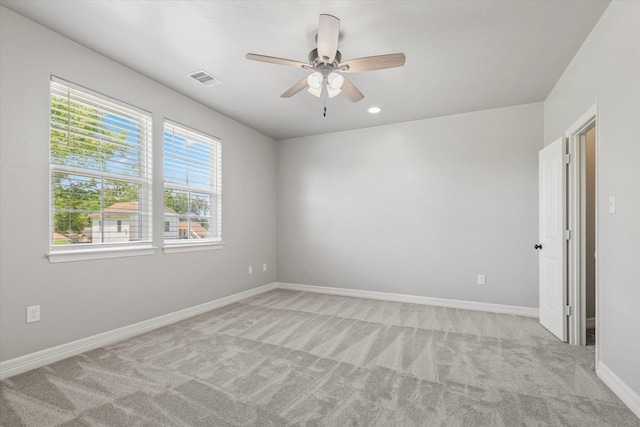 2800 Virginia Ave, League City, TX 77573 - unfurnished room with light carpet, a ceiling fan, baseboards, and recessed lighting