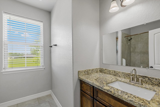 2800 Virginia Ave, League City, TX 77573 - full bath with baseboards, tile patterned floors, vanity, and a shower