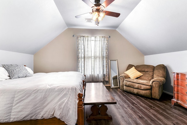 bedroom featuring wood finished floors, lofted ceiling, and a ceiling fan