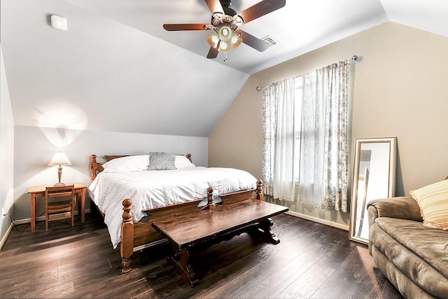 bedroom with lofted ceiling, wood finished floors, ceiling fan, and baseboards