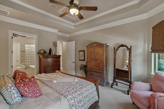 401 Bastrop Dr, Allen, TX 75013 - bedroom featuring light carpet, a tray ceiling, ornamental molding, connected bathroom, and a ceiling fan