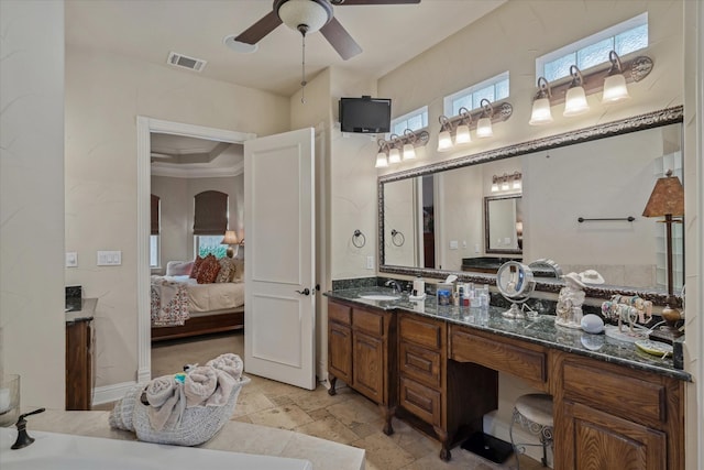 401 Bastrop Dr, Allen, TX 75013 - bathroom featuring ensuite bathroom, ceiling fan, vanity, stone tile floors, and ornamental molding