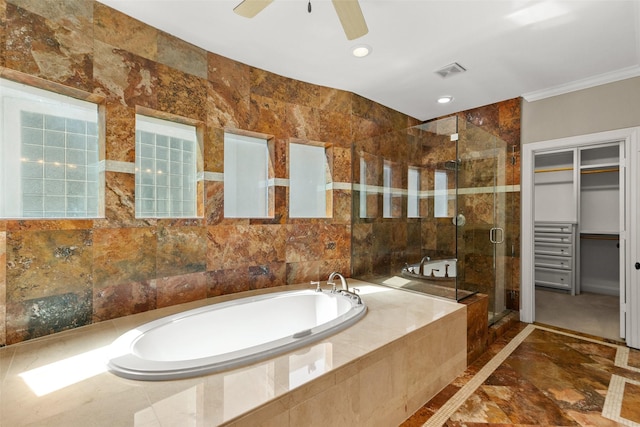 6635 Wanita Pl Unit B, Houston, TX 77007 - full bath with inlaid floor details, a stall shower, a garden tub, ornamental molding, and a walk in closet