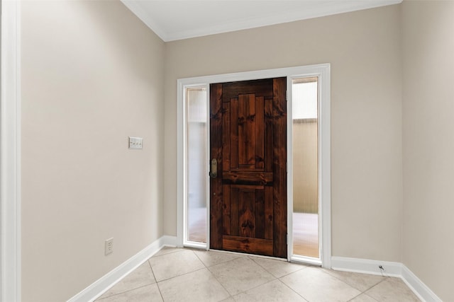 6635 Wanita Pl Unit B, Houston, TX 77007 - foyer entrance with tile patterned flooring, crown molding, and baseboards
