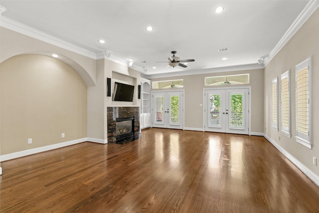 6635 Wanita Pl Unit B, Houston, TX 77007 - unfurnished living room featuring french doors, recessed lighting, ornamental molding, a glass covered fireplace, and a ceiling fan