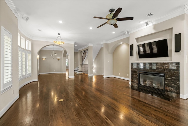 6635 Wanita Pl Unit B, Houston, TX 77007 - unfurnished living room with arched walkways, a fireplace with flush hearth, wood finished floors, ceiling fan, and recessed lighting