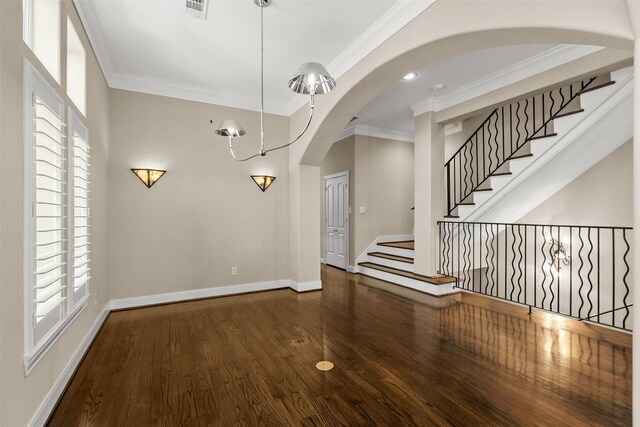 6635 Wanita Pl Unit B, Houston, TX 77007 - unfurnished room with wood finished floors, crown molding, baseboards, healthy amount of natural light, and stairs