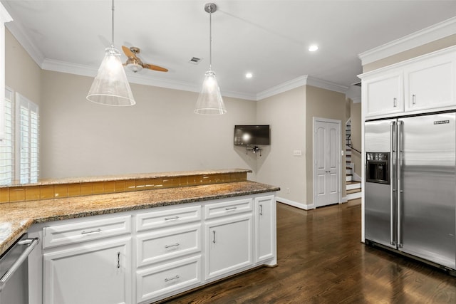6635 Wanita Pl Unit B, Houston, TX 77007 - kitchen with stainless steel appliances, ornamental molding, recessed lighting, dark wood-style flooring, and hanging light fixtures