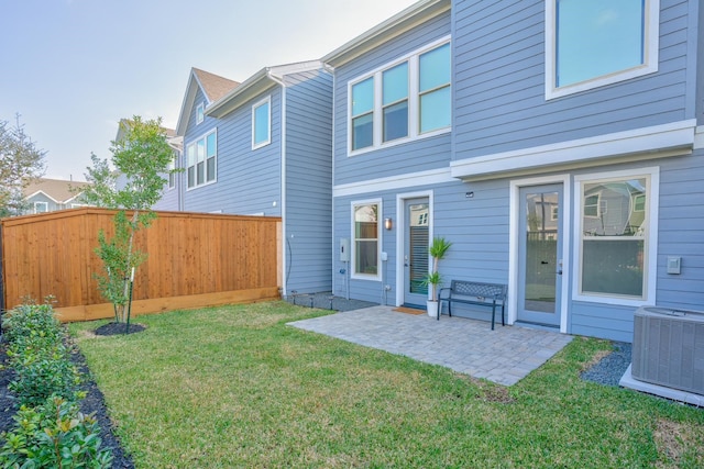 10920 Keaton Landing Dr, Houston, TX 77043 - back of property featuring central air condition unit and a patio area
