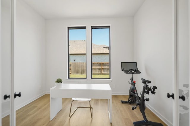 30246 Gold Finch Pl, Fulshear, TX 77441 - office with light wood finished floors, baseboards, and french doors