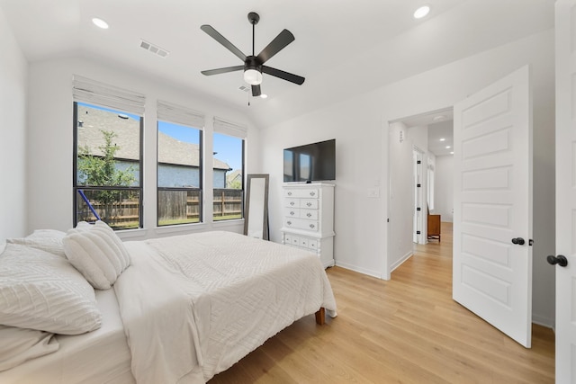 30246 Gold Finch Pl, Fulshear, TX 77441 - bedroom with light wood finished floors, recessed lighting, lofted ceiling, baseboards, and a ceiling fan