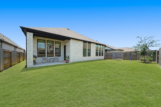 30246 Gold Finch Pl, Fulshear, TX 77441 - rear view of house with a patio area and a shingled roof