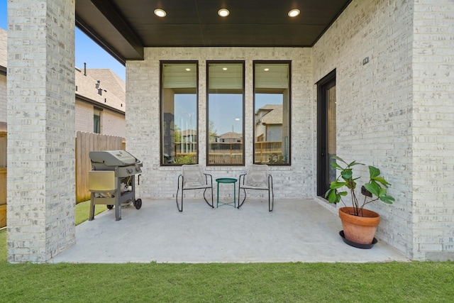 30246 Gold Finch Pl, Fulshear, TX 77441 - view of patio featuring fence and grilling area
