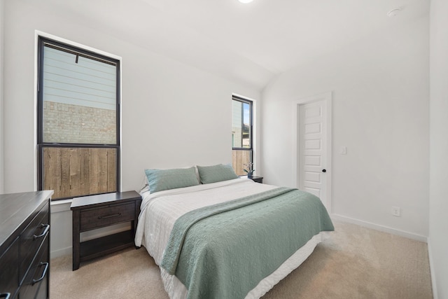 30246 Gold Finch Pl, Fulshear, TX 77441 - bedroom featuring light colored carpet, lofted ceiling, and baseboards