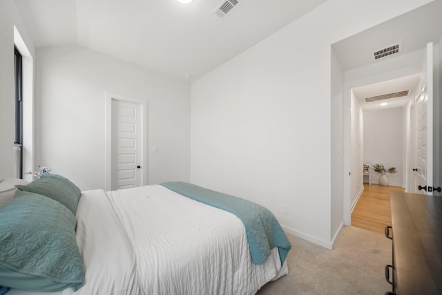 30246 Gold Finch Pl, Fulshear, TX 77441 - bedroom with lofted ceiling, light colored carpet, and baseboards