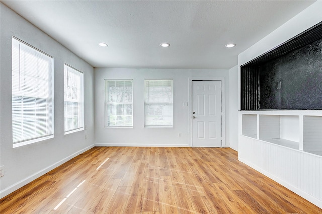 1316 Bailey St, Wharton, TX 77488 - entryway featuring light wood-style floors, recessed lighting, and baseboards