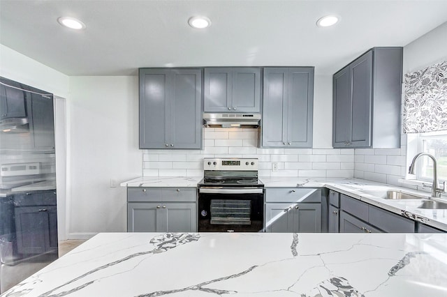 1316 Bailey St, Wharton, TX 77488 - kitchen featuring electric range, under cabinet range hood, gray cabinets, a sink, and recessed lighting