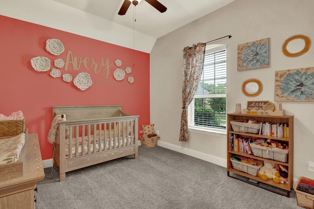 510 Blossom Cove Ct, Pinehurst, TX 77362 - bedroom featuring a nursery area, carpet floors, vaulted ceiling, baseboards, and ceiling fan