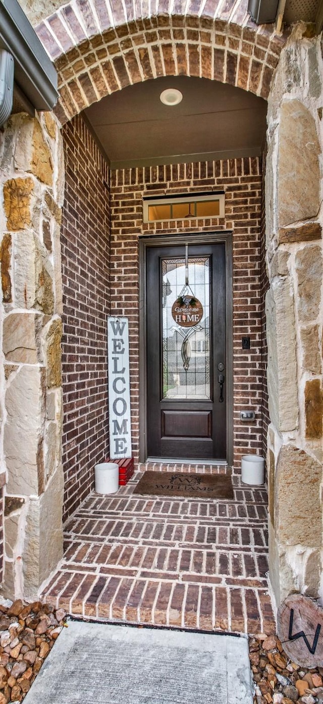 510 Blossom Cove Ct, Pinehurst, TX 77362 - property entrance with brick siding