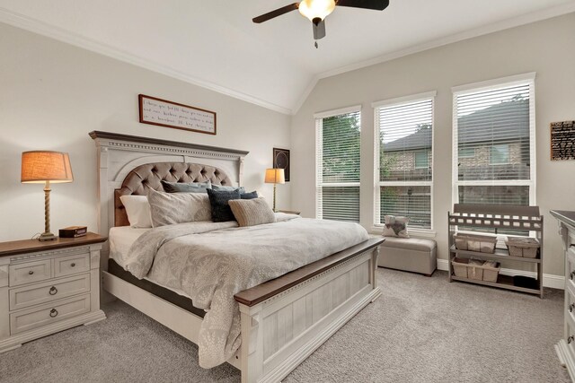 510 Blossom Cove Ct, Pinehurst, TX 77362 - bedroom with ornamental molding, light carpet, vaulted ceiling, a ceiling fan, and baseboards