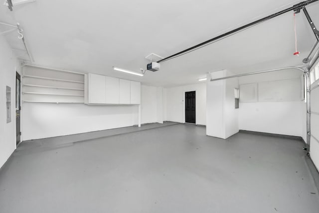 5638 N Braeswood Blvd, Houston, TX 77096 - garage with a garage door opener
