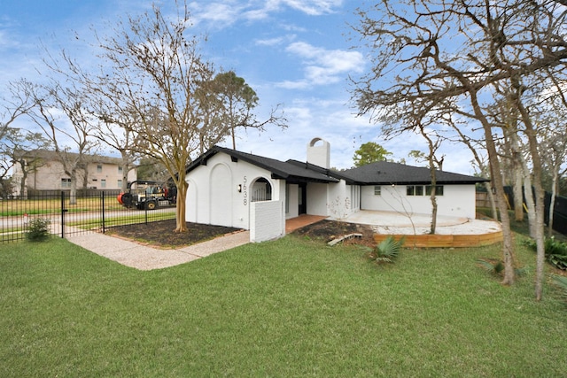 5638 N Braeswood Blvd, Houston, TX 77096 - back of property featuring a chimney
