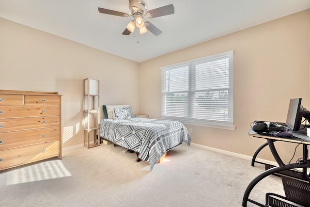 4106 Alice Dr, Sugar Land, TX 77478 - bedroom featuring baseboards, light colored carpet, ceiling fan, and a desk
