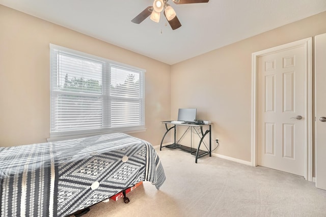 4106 Alice Dr, Sugar Land, TX 77478 - carpeted bedroom featuring baseboards and a ceiling fan