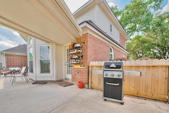 4106 Alice Dr, Sugar Land, TX 77478 - view of patio with fence and area for grilling