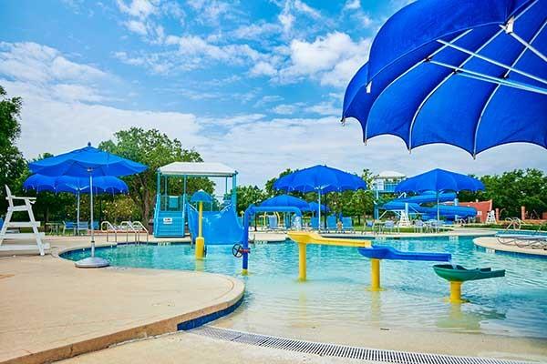 4106 Alice Dr, Sugar Land, TX 77478 - community pool featuring a water play area and a water slide