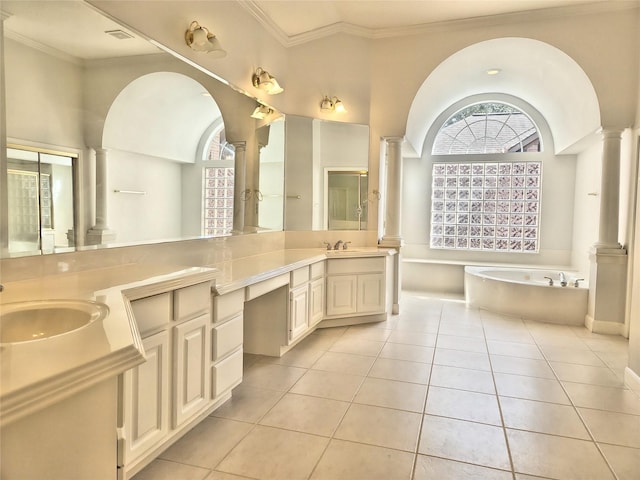 9923 Eden Valley Dr, Spring, TX 77379 - bathroom featuring ornate columns, tile patterned floors, a bath, crown molding, and vanity