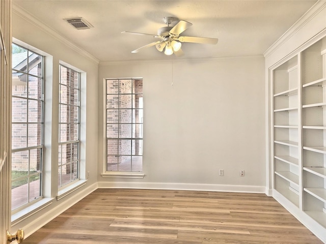 9923 Eden Valley Dr, Spring, TX 77379 - spare room with a ceiling fan, baseboards, ornamental molding, and wood finished floors