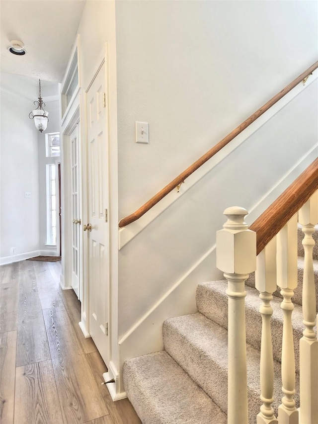 9923 Eden Valley Dr, Spring, TX 77379 - staircase featuring wood finished floors