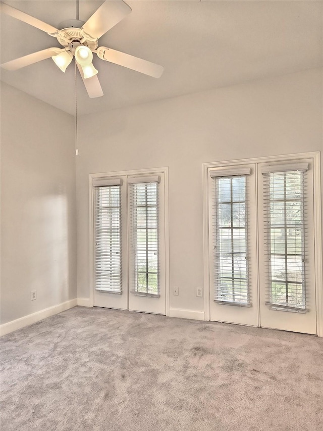 9923 Eden Valley Dr, Spring, TX 77379 - carpeted spare room with baseboards and a ceiling fan