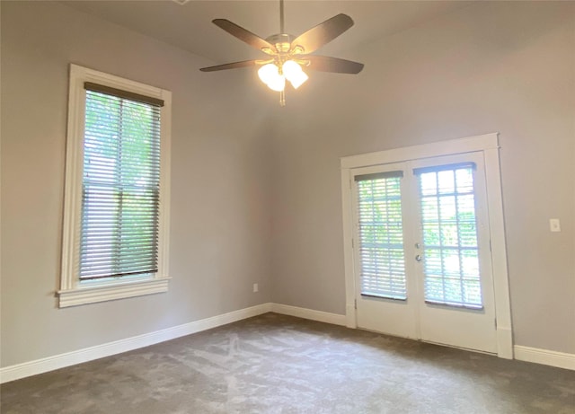 2012 Avenue N 1/2 Ave N 1/2, Galveston, TX 77550 - carpeted spare room featuring plenty of natural light, a ceiling fan, and french doors