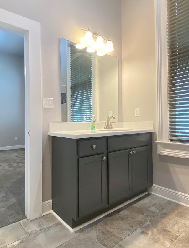 2012 Avenue N 1/2 Ave N 1/2, Galveston, TX 77550 - bathroom with baseboards and vanity