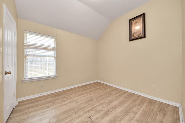 3018 Wellington Pass Dr, Spring, TX 77373 - additional living space featuring light wood-style flooring, lofted ceiling, and baseboards