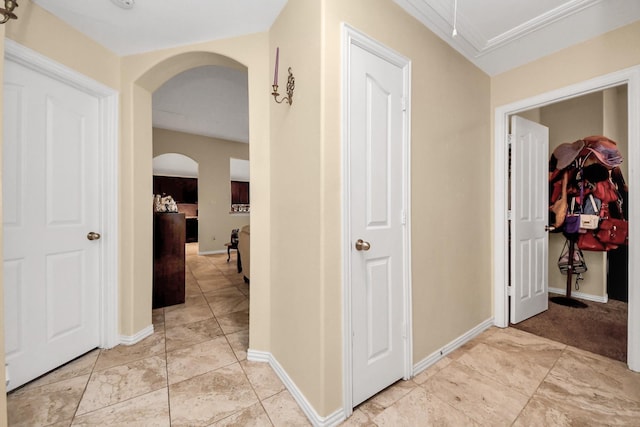 3018 Wellington Pass Dr, Spring, TX 77373 - corridor with arched walkways, baseboards, and attic access