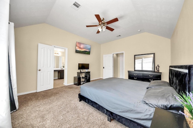 3018 Wellington Pass Dr, Spring, TX 77373 - bedroom with lofted ceiling, carpet floors, baseboards, a ceiling fan, and connected bathroom