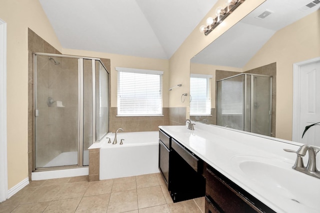 3018 Wellington Pass Dr, Spring, TX 77373 - bathroom featuring lofted ceiling, tile patterned flooring, a stall shower, a garden tub, and double vanity