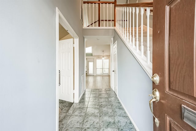 4315 Westheimer Rd, Houston, TX 77027 - entrance foyer featuring baseboards and marble look tile flooring