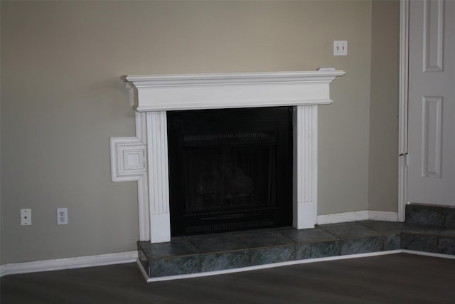 4315 Westheimer Rd, Houston, TX 77027 - detailed view of wood finished floors, a fireplace, and baseboards