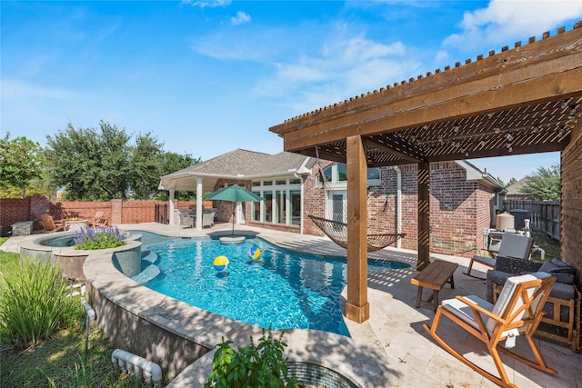 20123 Everhart Springs Ln, Cypress, TX 77433 - view of pool with a pergola, a jacuzzi, a fenced backyard, and a patio