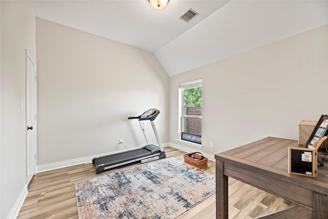 20123 Everhart Springs Ln, Cypress, TX 77433 - exercise area featuring baseboards, wood finished floors, and vaulted ceiling