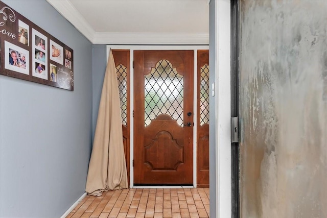 1520 Sycamore St, Navasota, TX 77868 - entrance foyer with brick patterned flooring and ornamental molding