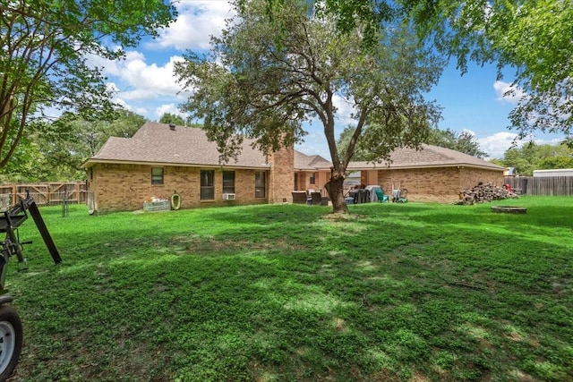 1520 Sycamore St, Navasota, TX 77868 - rear view of property with brick siding