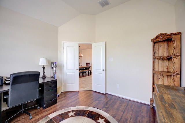 13203 Edison Trace Ln, Tomball, TX 77377 - home office featuring wood finished floors, high vaulted ceiling, and baseboards