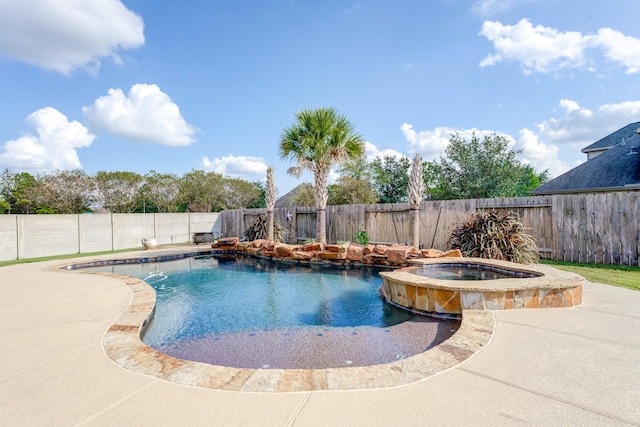 13203 Edison Trace Ln, Tomball, TX 77377 - view of swimming pool featuring a fenced backyard, a pool with connected hot tub, and a patio area