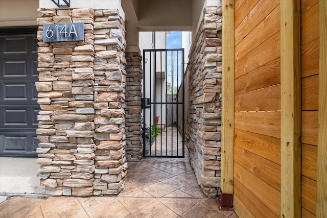 614 W Bell St Unit A, Houston, TX 77019 - view of exterior entry featuring a gate